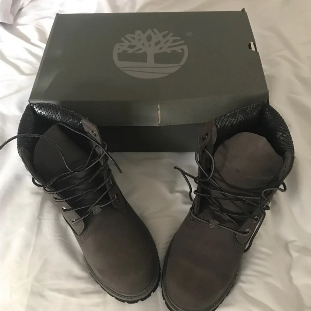 grey and black timberlands